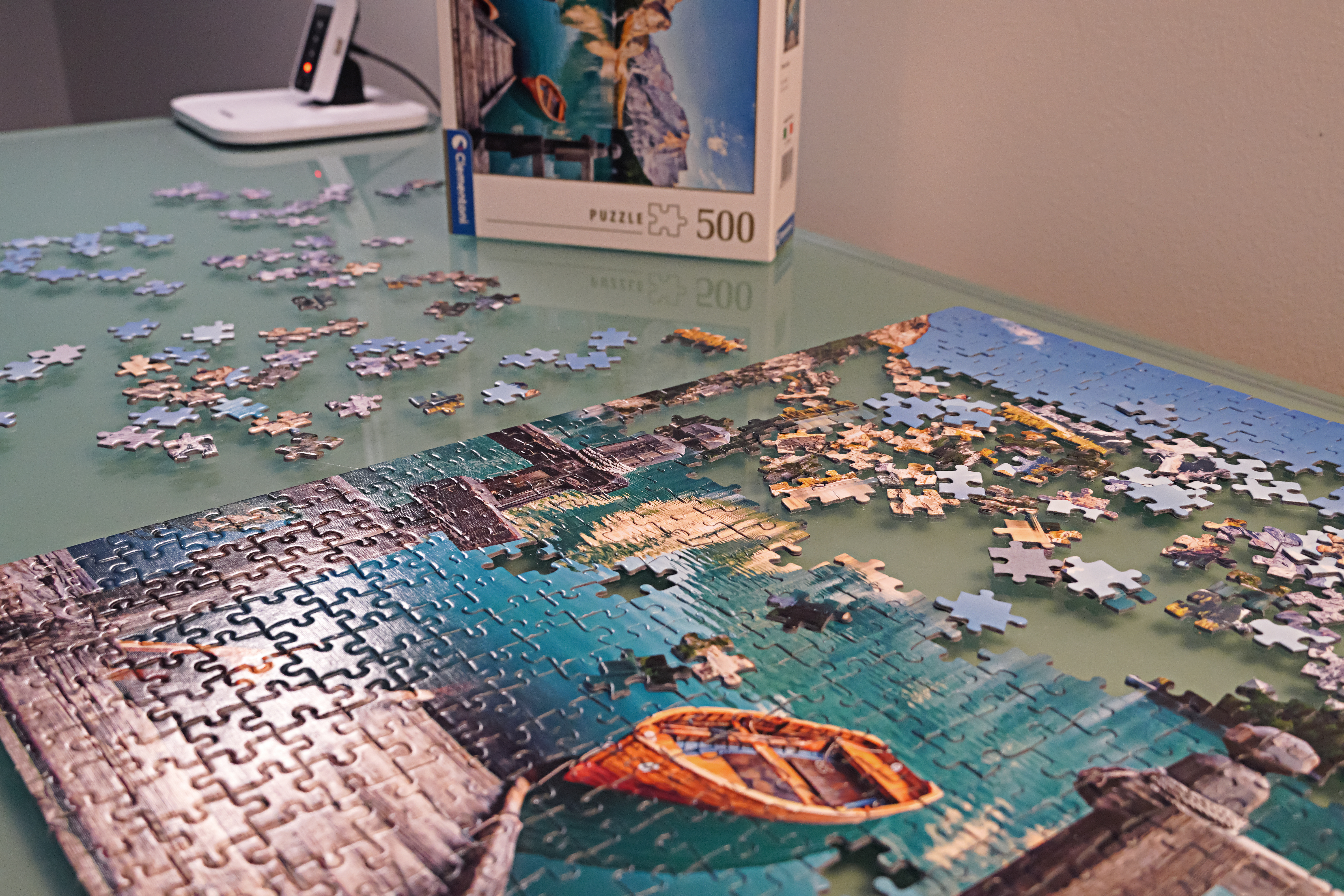 Close up on a partially completed, colorful puzzle.